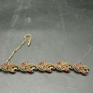 Red rhinestone and Gold Leaf Bracelet with Red Accents **broken**